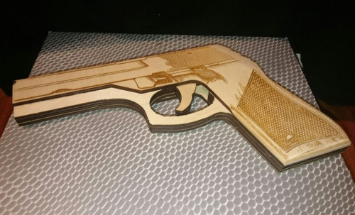 Изображение Деревянный пистолет стреляющий резинками