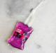 Изображение Аптечка от розовых соплей: конфеты, ручка, пупырка, пакет для жидкости